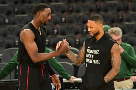 Oct 30, 2023; Milwaukee, Wisconsin, USA; Miami Heat center Bam Adebayo (13) greets Milwaukee Bucks guard Damian Lillard (0) before the game at Fiserv Forum.
