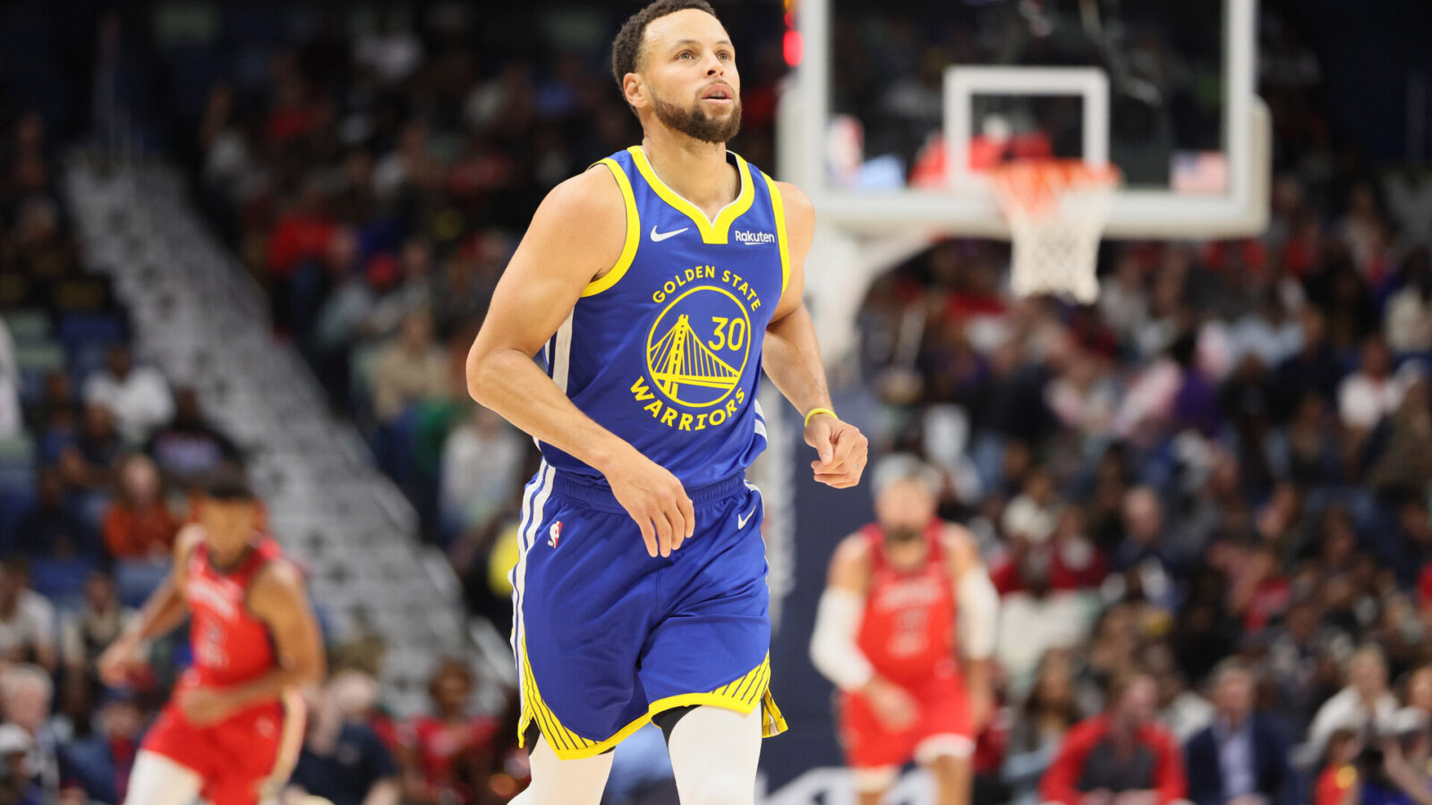 Oct 30, 2023; New Orleans, Louisiana, USA; Golden State Warriors guard Stephen Curry (30) runs down the court after making a 3-point shot in the first quarter at Smoothie King Center