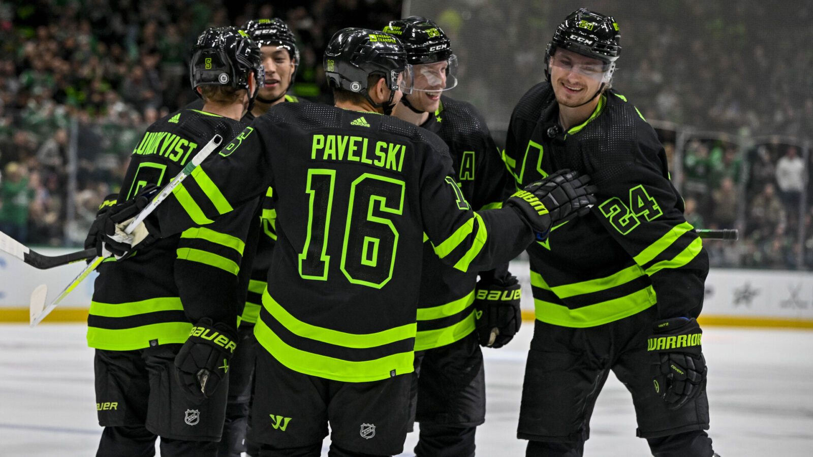 Oct 30, 2023; Dallas, Texas, USA; Dallas Stars center Joe Pavelski (16) and center Roope Hintz (24) and left wing Jason Robertson (21) and defenseman Esa Lindell (23) and defenseman Nils Lundkvist (5) celebrates a goal by Hintz against the Columbus Blue Jackets during the second period at the American Airlines Center.