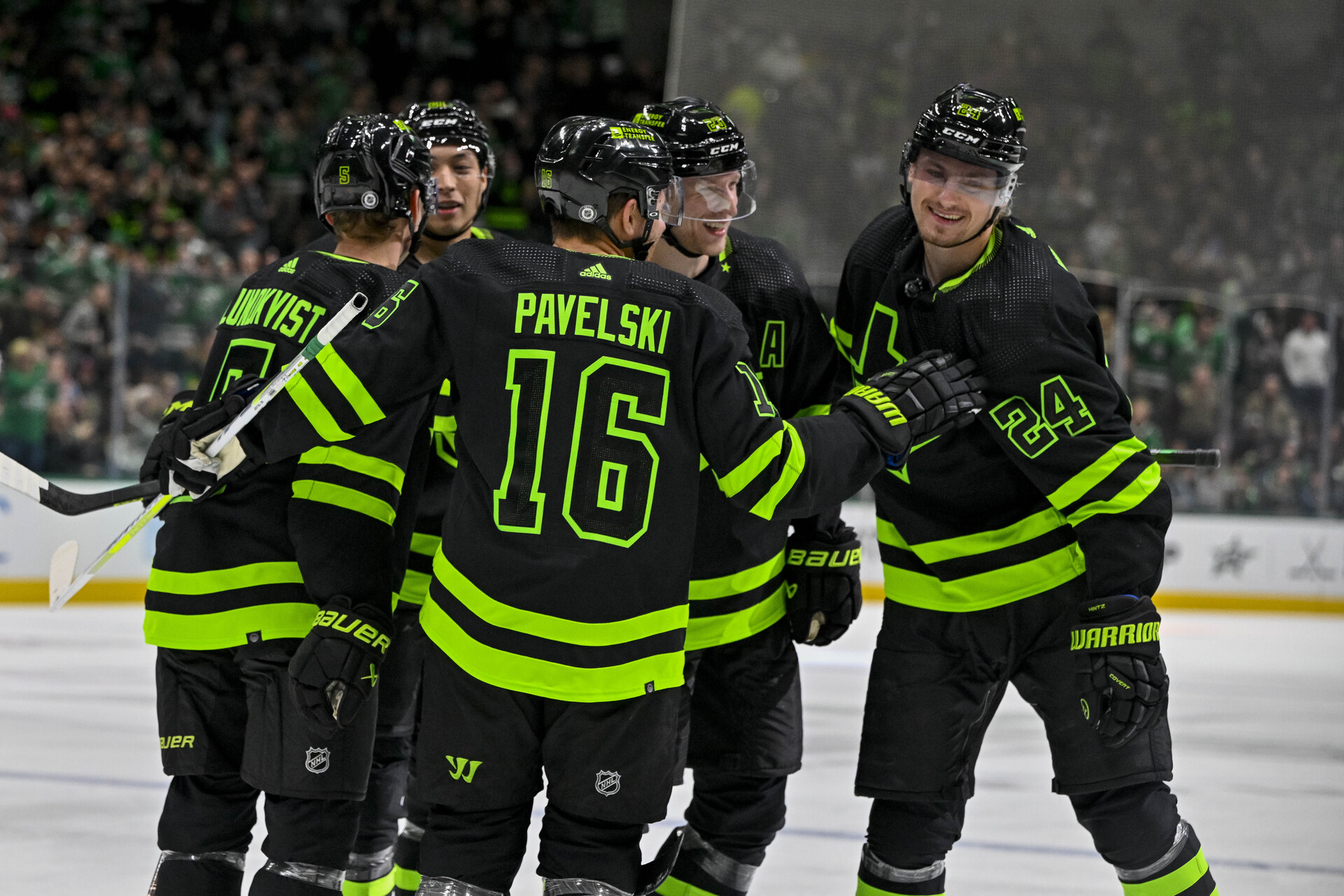 Oct 30, 2023; Dallas, Texas, USA; Dallas Stars center Joe Pavelski (16) and center Roope Hintz (24) and left wing Jason Robertson (21) and defenseman Esa Lindell (23) and defenseman Nils Lundkvist (5) celebrates a goal by Hintz against the Columbus Blue Jackets during the second period at the American Airlines Center.