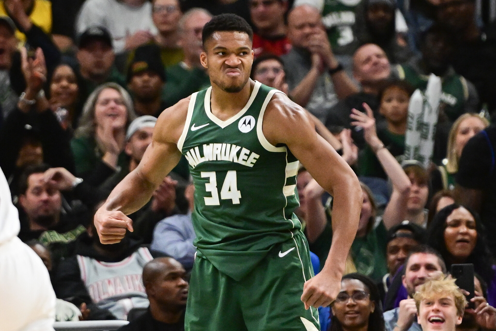 Oct 30, 2023; Milwaukee, Wisconsin, USA; Milwaukee Bucks forward Giannis Antetokounmpo (34) reacts after scoring a basket in the fourth quarter against the Miami Heat at Fiserv Forum.