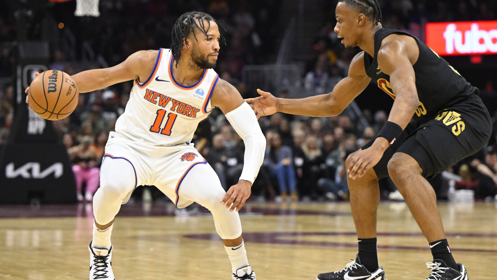 Oct 31, 2023; Cleveland, Ohio, USA; Cleveland Cavaliers forward Isaac Okoro (35) defends New York Knicks guard Jalen Brunson (11) in the second quarter at Rocket Mortgage FieldHouse.