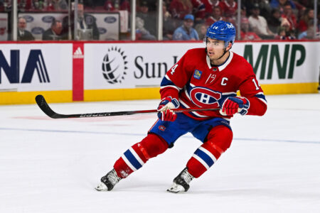 Oct 28, 2023; Montreal, Quebec, CAN; Montreal Canadiens center Nick Suzuki (14) against the Winnipeg Jets during overtime at Bell Centre.