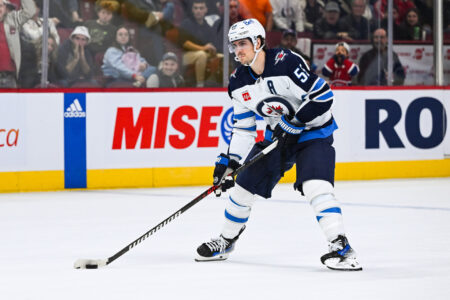 Oct 28, 2023; Montreal, Quebec, CAN; Winnipeg Jets center Mark Scheifele (55) plays the puck during shootout against the Montreal