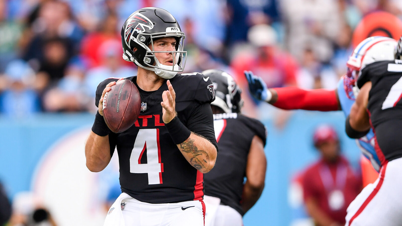Oct 29, 2023; Nashville, Tennessee, USA; Atlanta Falcons quarterback Taylor Heinicke (4) against the Tennessee Titans during the first second at Nissan Stadium.