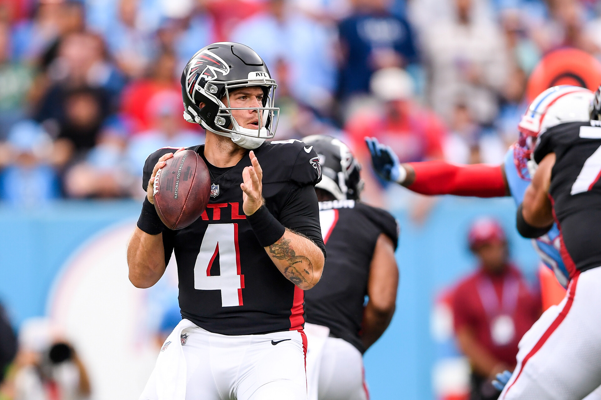 Oct 29, 2023; Nashville, Tennessee, USA; Atlanta Falcons quarterback Taylor Heinicke (4) against the Tennessee Titans during the first second at Nissan Stadium.