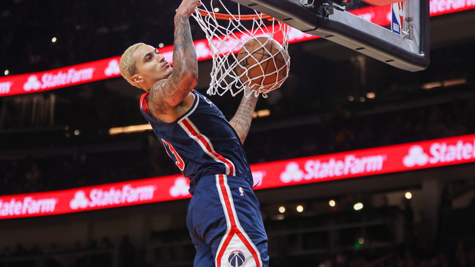 Nov 1, 2023; Atlanta, Georgia, USA; Washington Wizards forward Kyle Kuzma (33) dunks against the Atlanta Hawks in the second half at State Farm Arena.