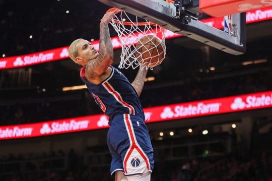 Nov 1, 2023; Atlanta, Georgia, USA; Washington Wizards forward Kyle Kuzma (33) dunks against the Atlanta Hawks in the second half at State Farm Arena.