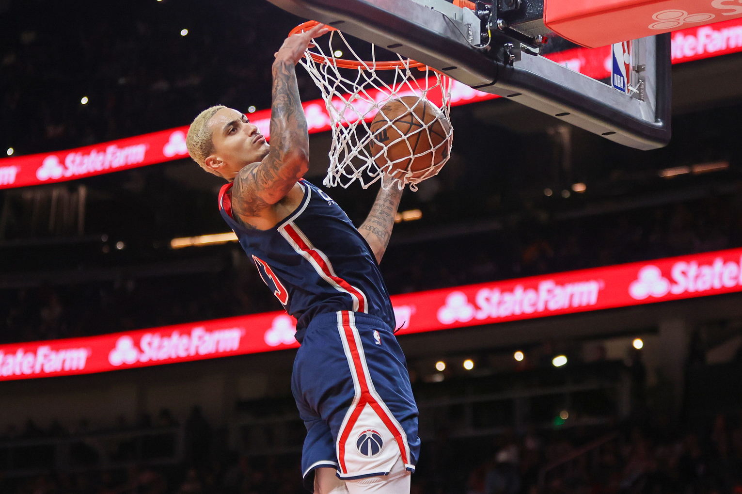 Nov 1, 2023; Atlanta, Georgia, USA; Washington Wizards forward Kyle Kuzma (33) dunks against the Atlanta Hawks in the second half at State Farm Arena.