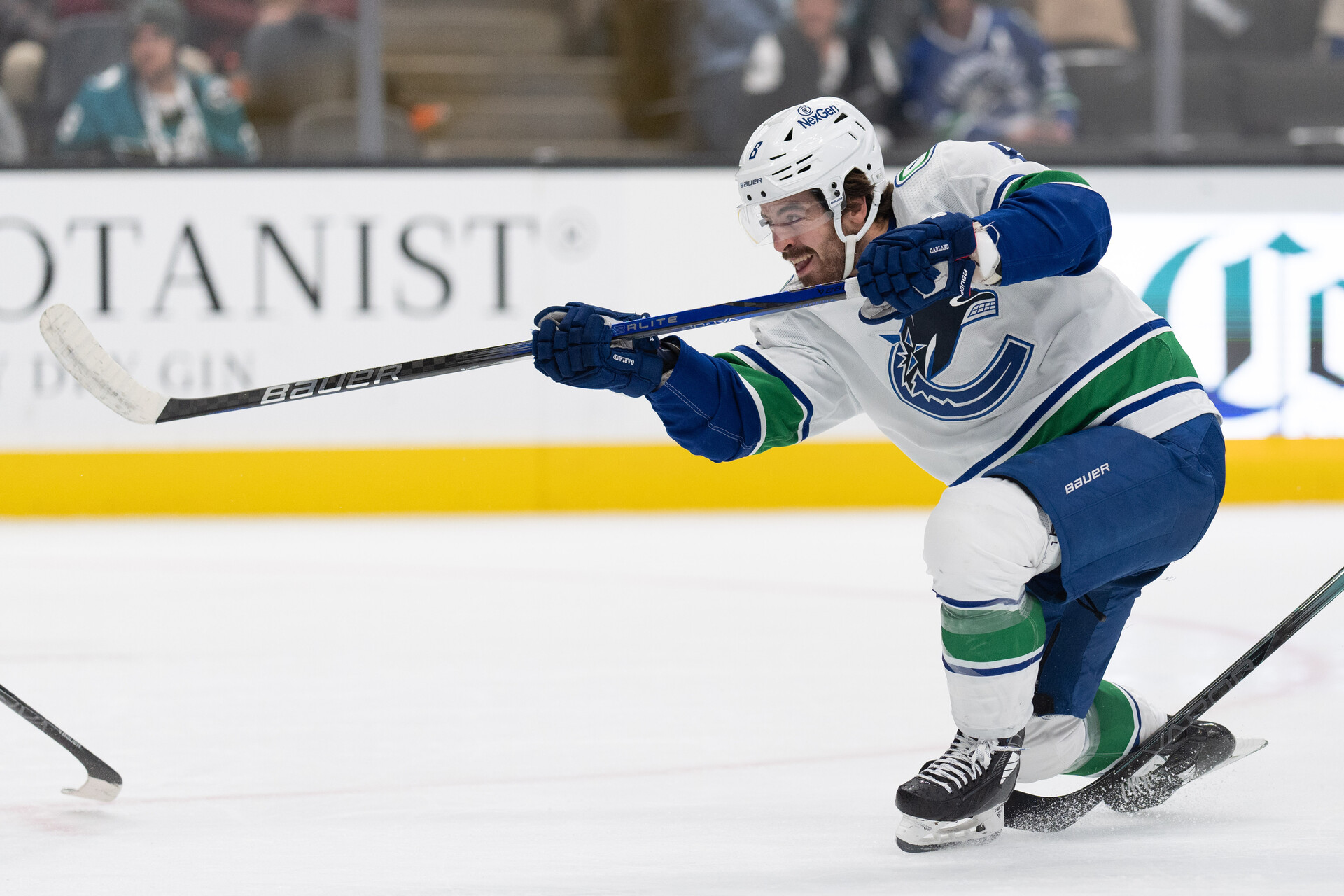 Nov 2, 2023; San Jose, California, USA; Vancouver Canucks right wing Conor Garland (8) shoots the puck during the third period against the San Jose Sharks at SAP Center at San Jose