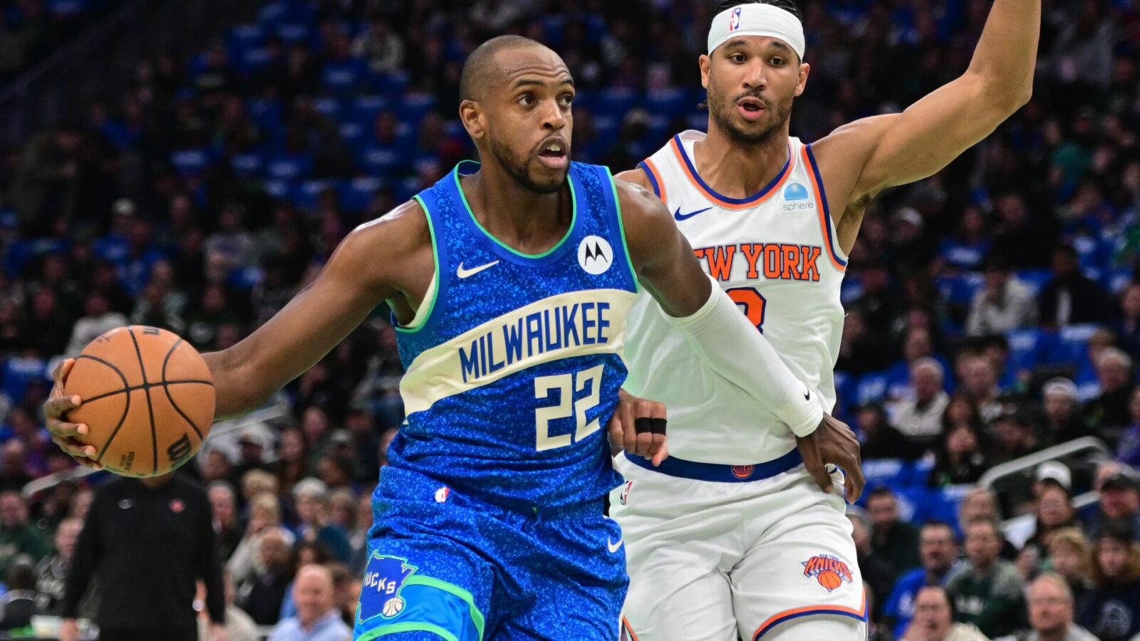 Milwaukee Bucks center Khris Middleton (22) drives for the basket against New York Knicks guard Josh Hart (3) in the first quarter at Fiserv Forum.
