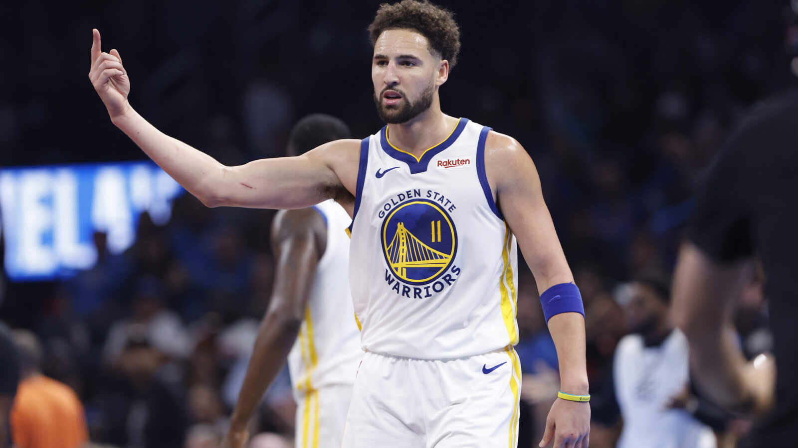 Nov 3, 2023; Oklahoma City, Oklahoma, USA; Golden State Warriors guard Klay Thompson (11) gestures after scoring against the Oklahoma City Thunder during the second quarter at Paycom Center.