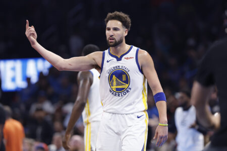 Nov 3, 2023; Oklahoma City, Oklahoma, USA; Golden State Warriors guard Klay Thompson (11) gestures after scoring against the Oklahoma City Thunder during the second quarter at Paycom Center.