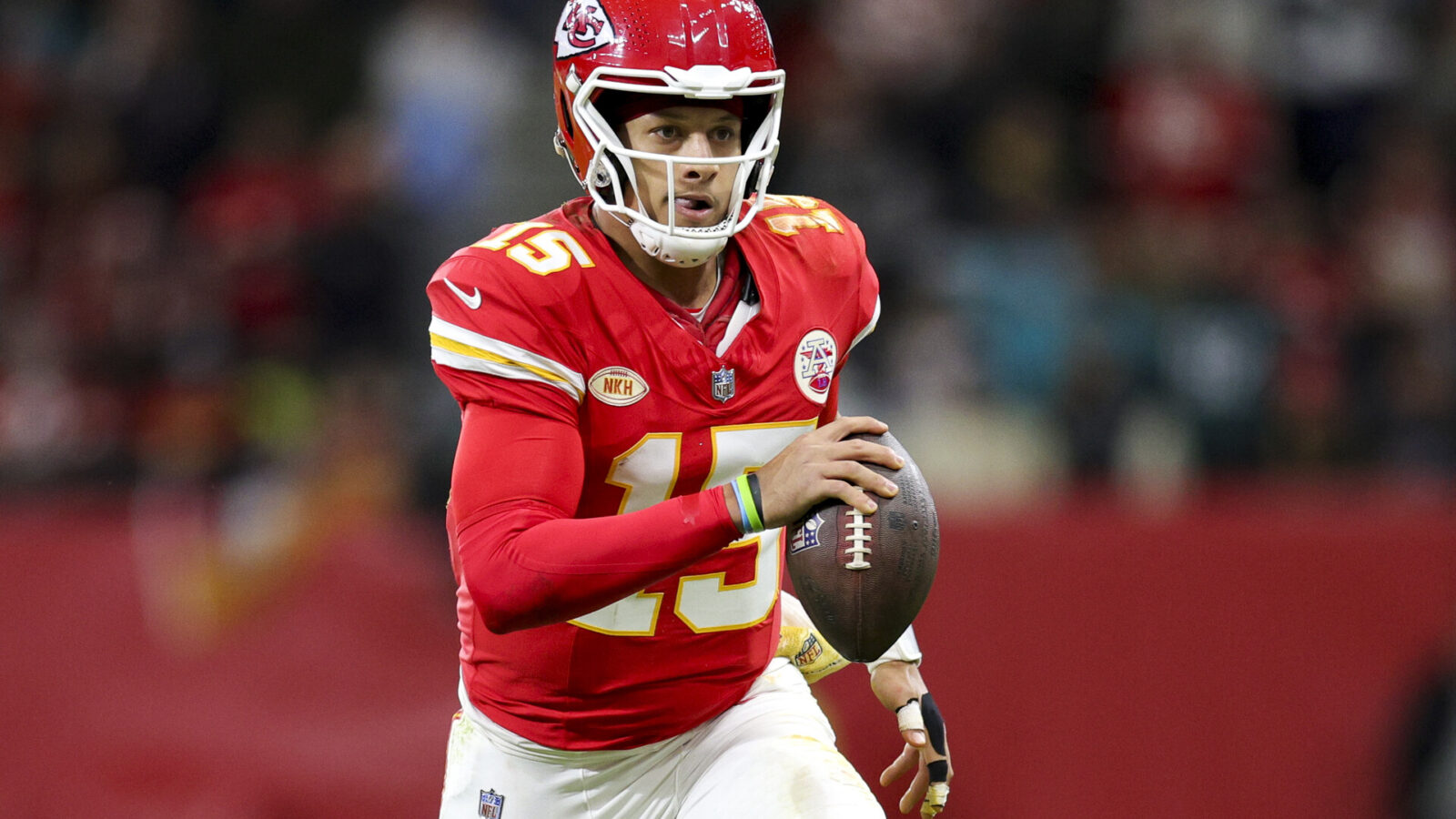 Nov 5, 2023; Frankfurt, Germany, ; Kansas City Chiefs quarterback Patrick Mahomes (15) runs with the ball against the Miami Dolphins in the second quarter during an NFL International Series game at Deutsche Bank Park.