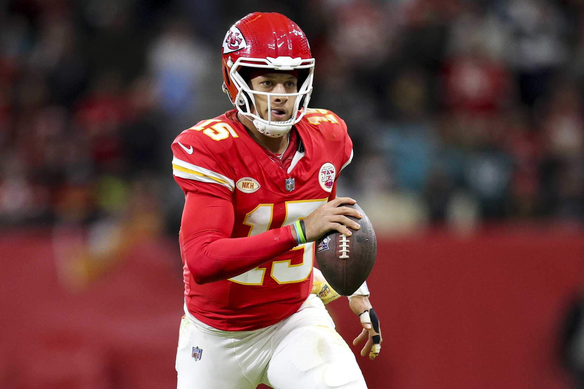 Nov 5, 2023; Frankfurt, Germany, ; Kansas City Chiefs quarterback Patrick Mahomes (15) runs with the ball against the Miami Dolphins in the second quarter during an NFL International Series game at Deutsche Bank Park.