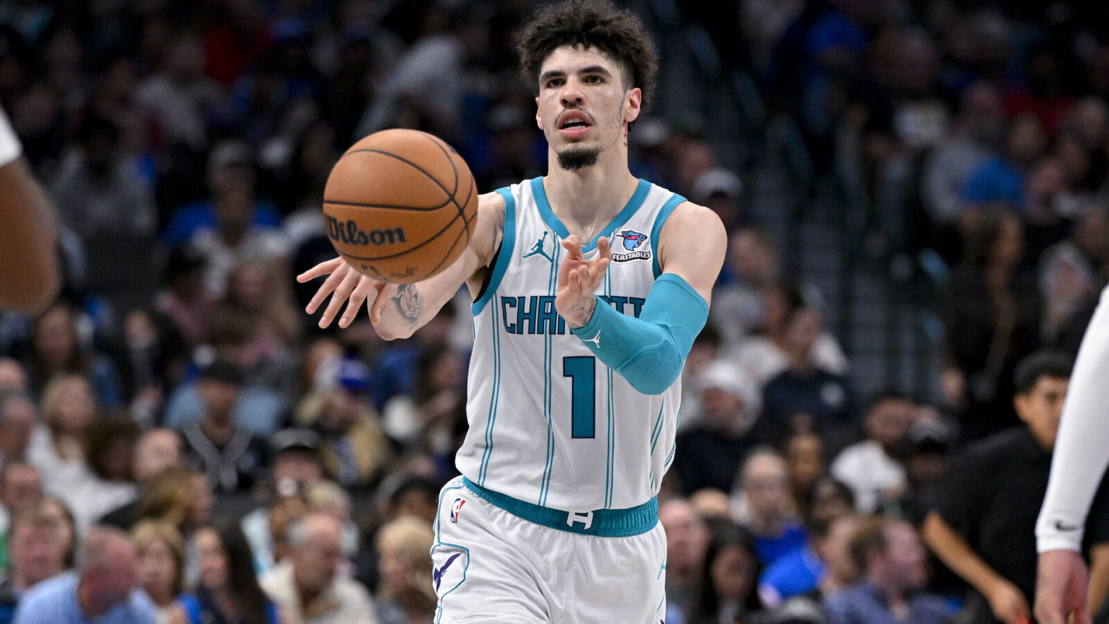 Nov 5, 2023; Dallas, Texas, USA; Charlotte Hornets guard LaMelo Ball (1) passes the ball against the Dallas Mavericks during the second half at the American Airlines Center