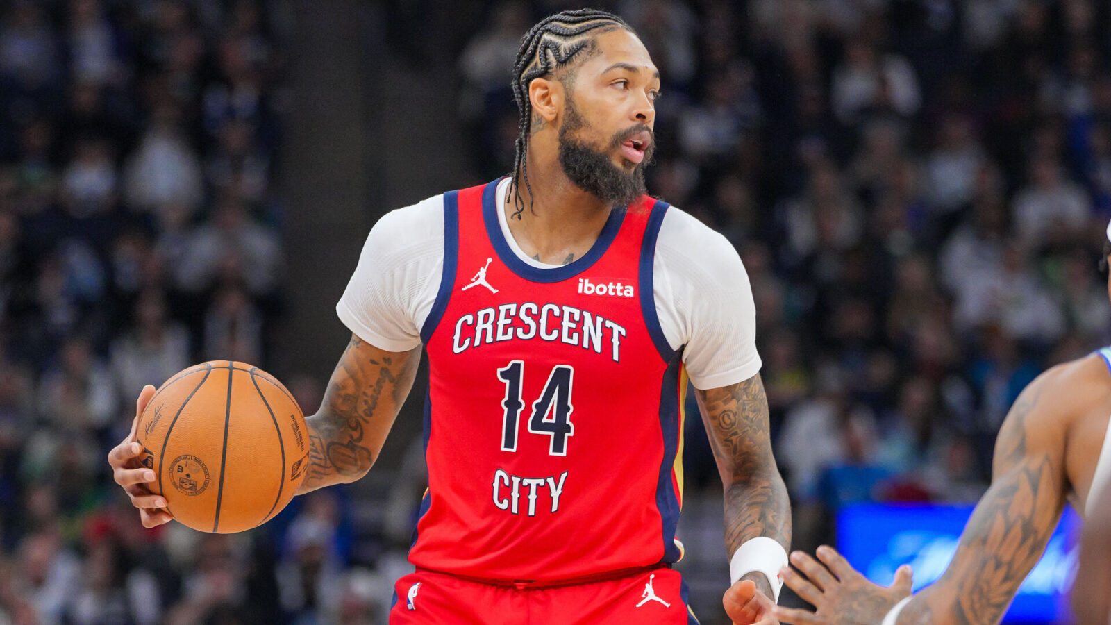 Nov 8, 2023; Minneapolis, Minnesota, USA; New Orleans Pelicans forward Brandon Ingram (14) dribbles against the Minnesota Timberwolves in the third quarter at Target Center