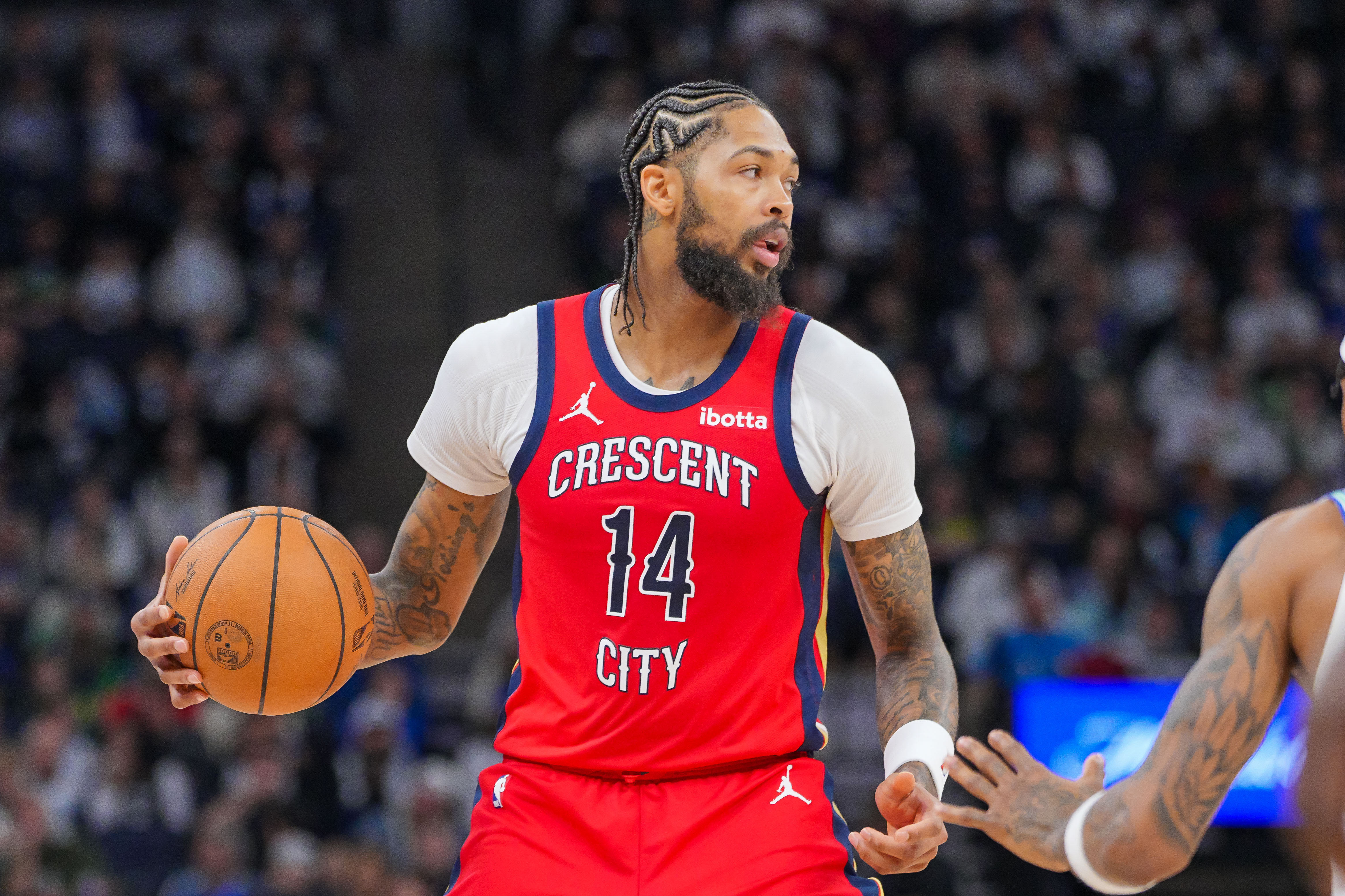 Nov 8, 2023; Minneapolis, Minnesota, USA; New Orleans Pelicans forward Brandon Ingram (14) dribbles against the Minnesota Timberwolves in the third quarter at Target Center