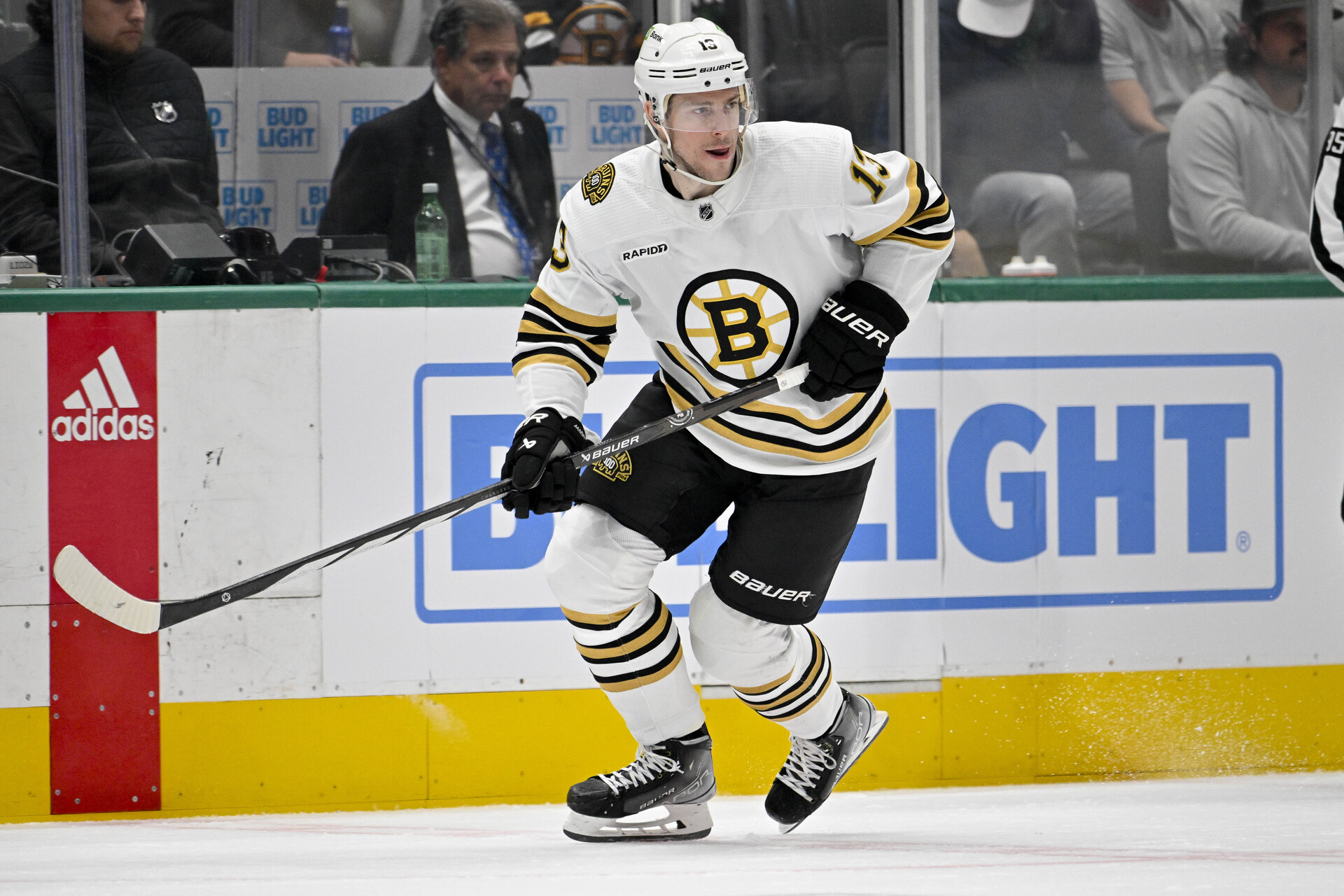 Boston Bruins center Charlie Coyle (13) in action during the game between the Dallas Stars and the Boston Bruins at the American Airlines Center.