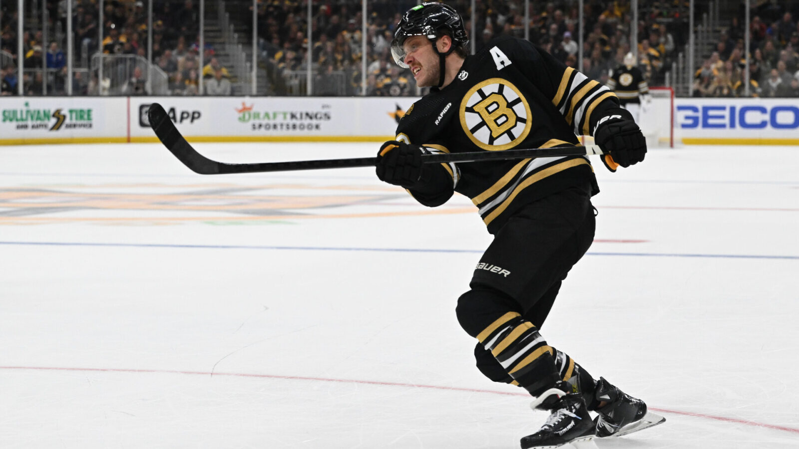 Nov 9, 2023; Boston, Massachusetts, USA; Boston Bruins right wing David Pastrnak (88) takes a shot against the New York Islanders during the third period at the TD Garden.