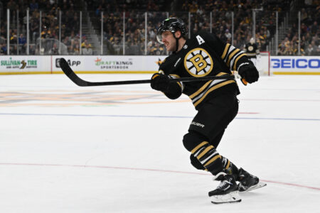 Nov 9, 2023; Boston, Massachusetts, USA; Boston Bruins right wing David Pastrnak (88) takes a shot against the New York Islanders during the third period at the TD Garden.