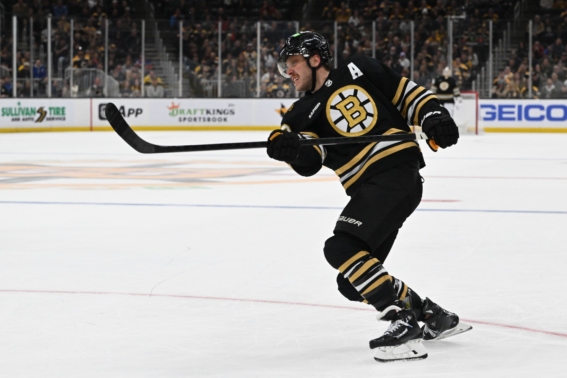 Nov 9, 2023; Boston, Massachusetts, USA; Boston Bruins right wing David Pastrnak (88) takes a shot against the New York Islanders during the third period at the TD Garden.
