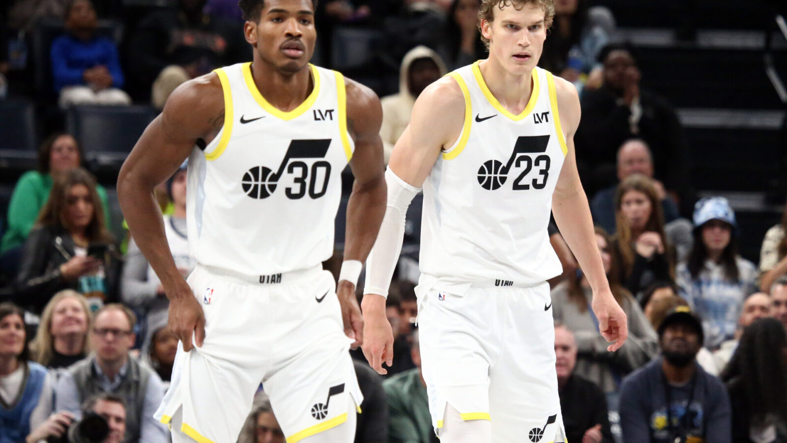 Nov 10, 2023; Memphis, Tennessee, USA; Utah Jazz guard Ochai Agbaji (30) and Utah Jazz forward Lauri Markkanen (23) get back on defense during the second half against the Memphis Grizzlies at FedExForum