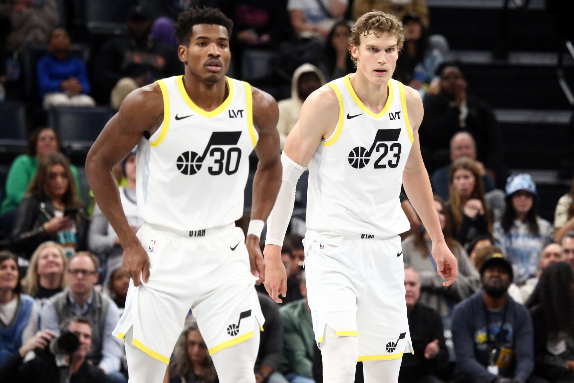 Nov 10, 2023; Memphis, Tennessee, USA; Utah Jazz guard Ochai Agbaji (30) and Utah Jazz forward Lauri Markkanen (23) get back on defense during the second half against the Memphis Grizzlies at FedExForum