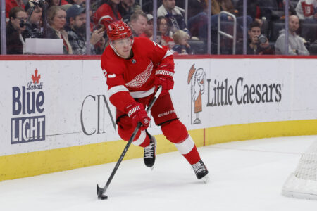 Nov 11, 2023; Detroit, Michigan, USA; Detroit Red Wings left wing Lucas Raymond (23) skates with the puck against the Columbus Blue Jackets in the second period at Little Caesars Arena.