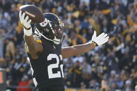 Nov 12, 2023; Pittsburgh, Pennsylvania, USA; Pittsburgh Steelers running back Najee Harris (22) reacts after scoring a touchdown against the Green Bay Packers during the first quarter at Acrisure Stadium.