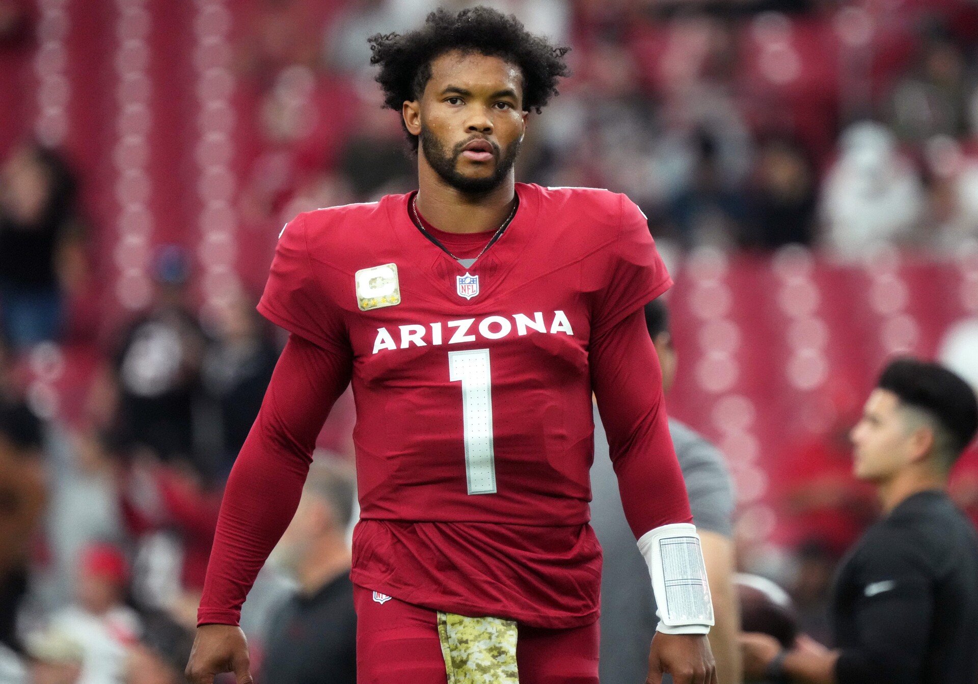 Arizona Cardinals quarterback Kyler Murray (1) warms up before their game against the Atlanta Falcons at State Farm Stadium in Glendale on Nov. 12, 2023.