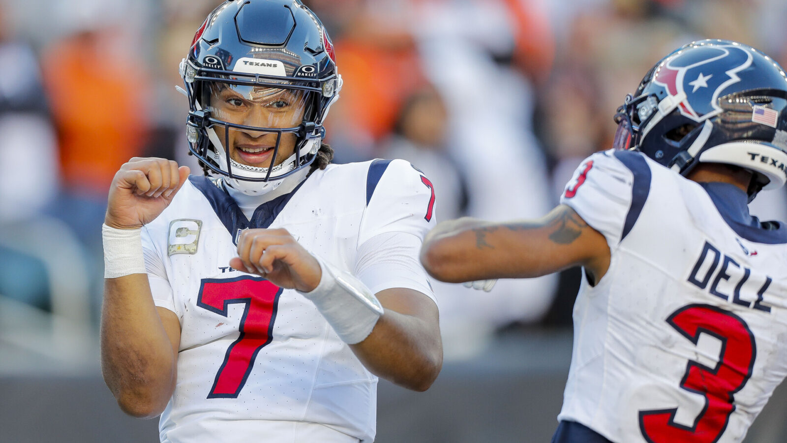 Houston Texans quarterback C.J. Stroud (7) reacts after scoring a touchdown with wide receiver Tank Dell (3) in the second half against the Cincinnati Bengals at Paycor Stadium.