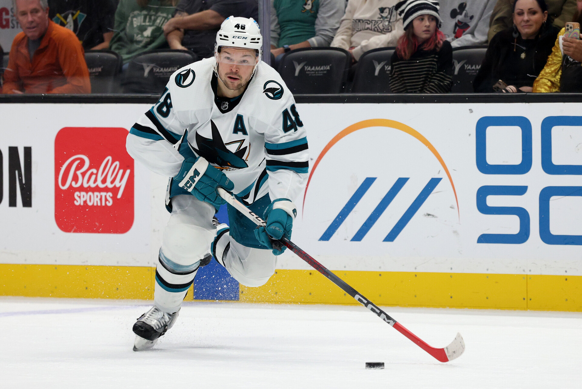 Nov 12, 2023; Anaheim, California, USA; San Jose Sharks center Tomas Hertl (48) skates with the puck during the first period against the Anaheim Ducks at Honda Center.