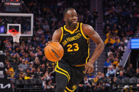 Nov 12, 2023; San Francisco, California, USA; Golden State Warriors forward Draymond Green (23) controls the ball against the Minnesota Timberwolves during the third quarter at Chase Center.