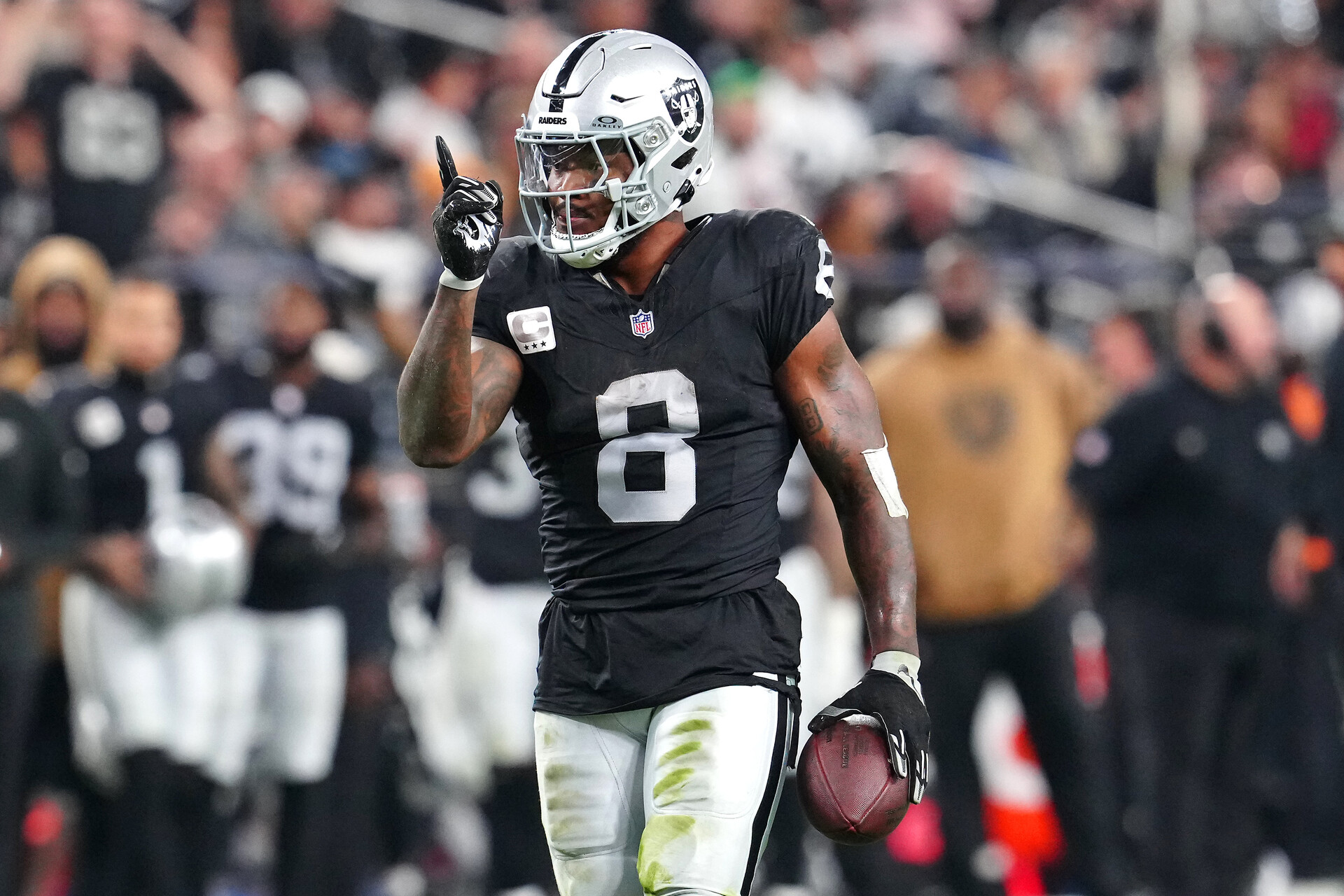 Nov 12, 2023; Paradise, Nevada, USA; Las Vegas Raiders running back Josh Jacobs (8) gestures after making a first down against the New York Jets during the third quarter at Allegiant Stadium.