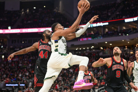 Nov 13, 2023; Milwaukee, Wisconsin, USA; Milwaukee Bucks forward Giannis Antetokounmpo (34) goes to the basket against Chicago Bulls forward Patrick Williams (44) and center Nikola Vucevic (9) in the fourth quarter at Fiserv Forum.