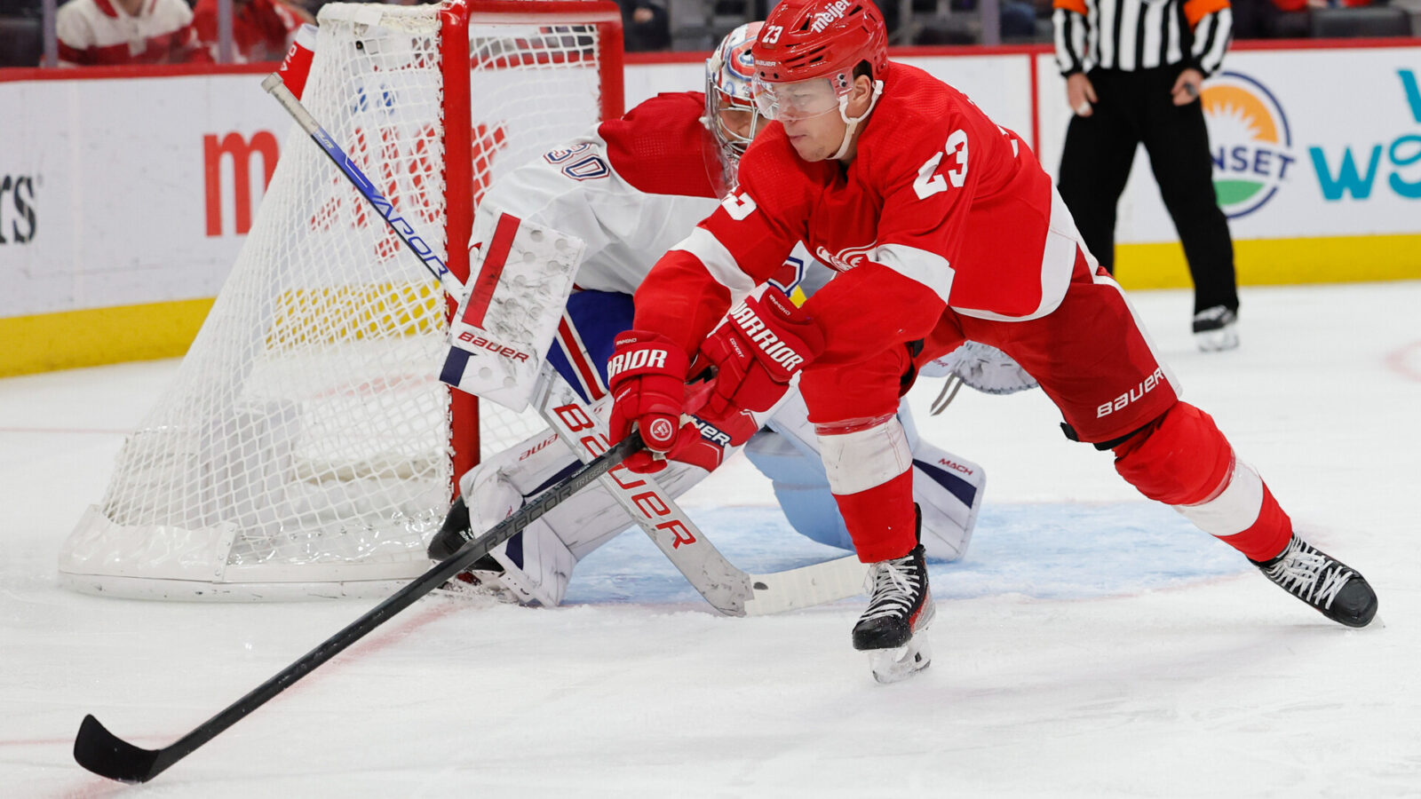 Nov 9, 2023; Detroit, Michigan, USA; Detroit Red Wings left wing Lucas Raymond (23) skates with the puck in the second period against the Montreal Canadiens at Little Caesars Arena.