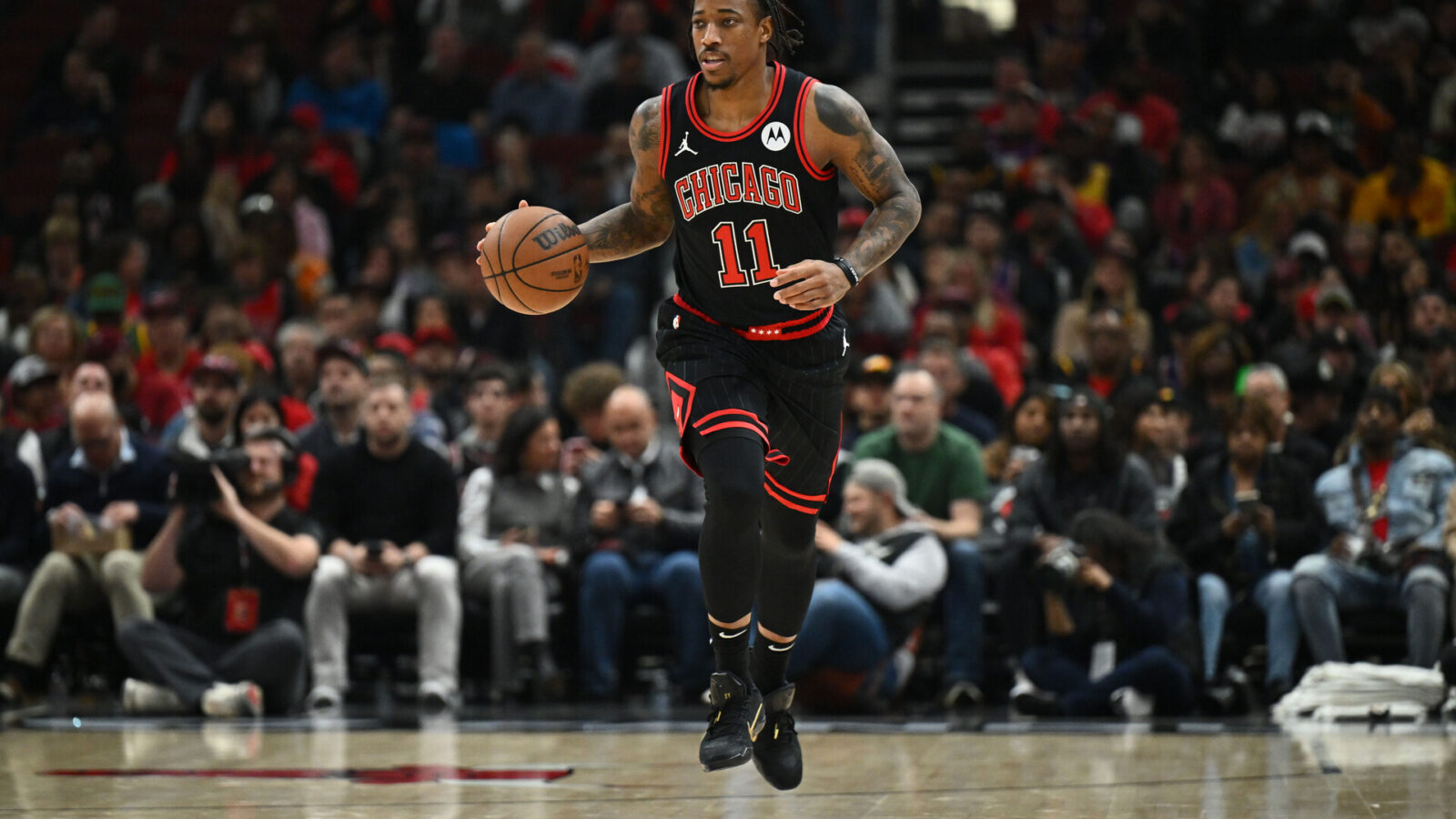 Nov 8, 2023; Chicago, Illinois, USA; Chicago Bulls guard DeMar DeRozan (11) controls the ball against the Phoenix Suns at United Center.