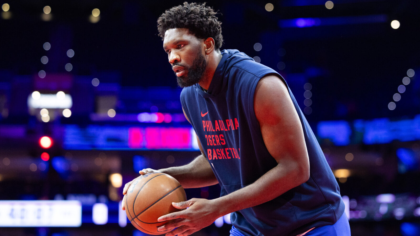 Nov 14, 2023; Philadelphia, Pennsylvania, USA; Philadelphia 76ers center Joel Embiid warms up before a game against the Indiana Pacers at Wells Fargo Center.
