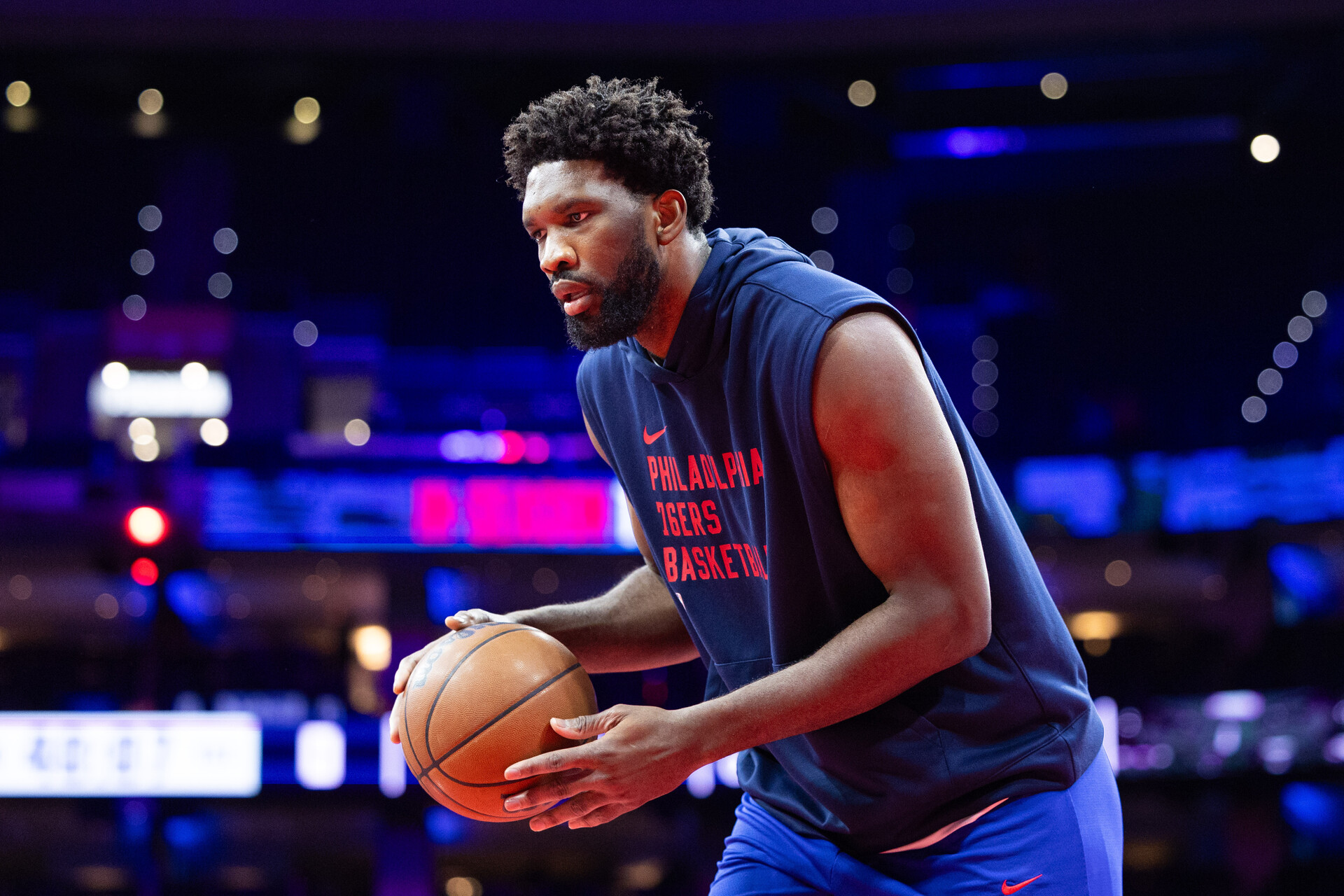 Nov 14, 2023; Philadelphia, Pennsylvania, USA; Philadelphia 76ers center Joel Embiid warms up before a game against the Indiana Pacers at Wells Fargo Center.