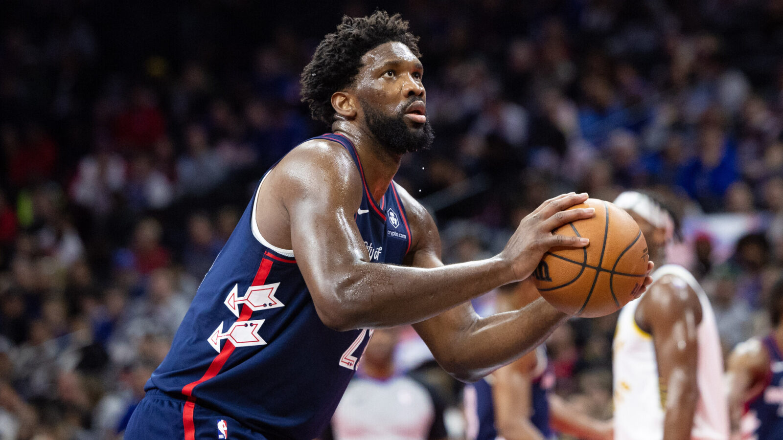 Nov 14, 2023; Philadelphia, Pennsylvania, USA; Philadelphia 76ers center Joel Embiid (21) shoots a technical foul shot against the Indiana Pacers during the second quarter at Wells Fargo Center.