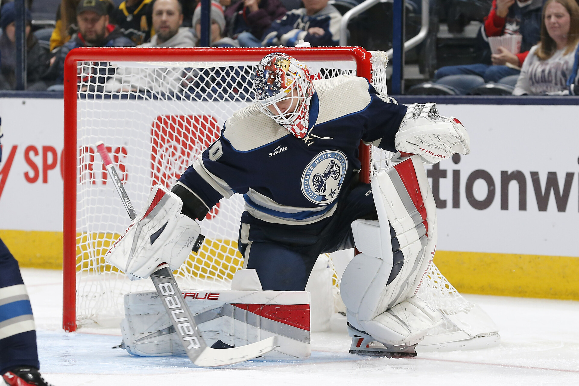Nov 14, 2023; Columbus, Ohio, USA; Columbus Blue Jackets goalie Elvis Merzlikins (90) makes a blocker save against the Pittsburgh Penguins during the second period at Nationwide Arena.