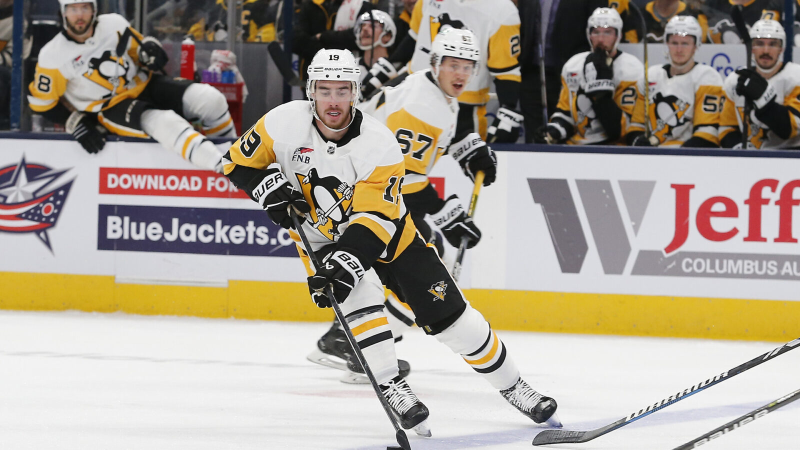 Nov 14, 2023; Columbus, Ohio, USA; Pittsburgh Penguins right wing Reilly Smith (19) skates with the puck against the Columbus Blue Jackets during the second period at Nationwide Arena.
