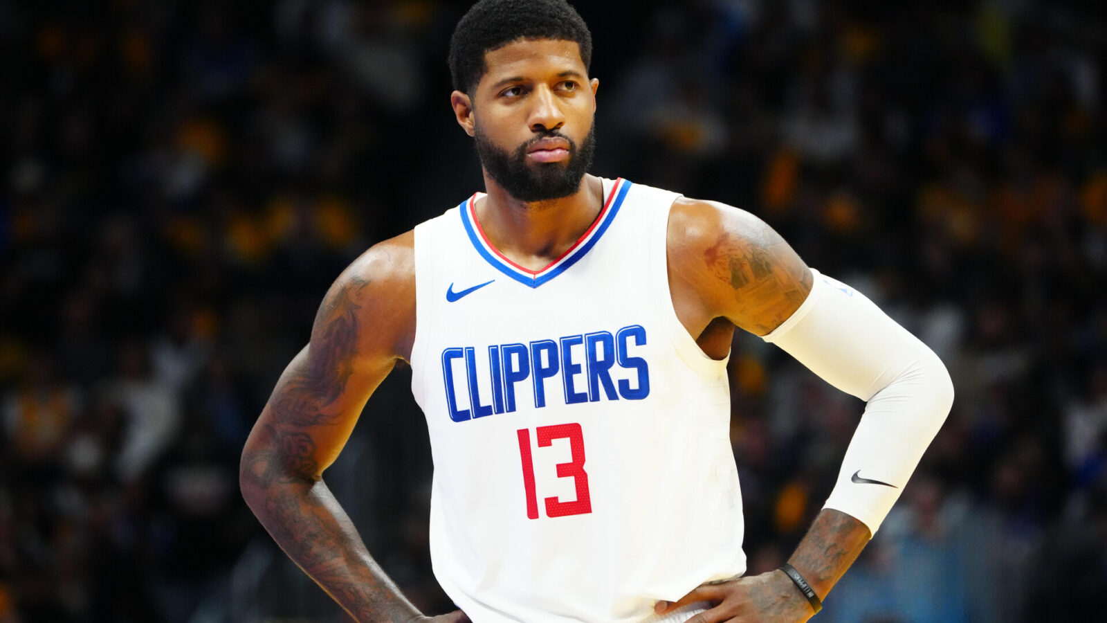 Nov 14, 2023; Denver, Colorado, USA; LA Clippers forward Paul George (13) reacts during in the second half against the Denver Nuggets at Ball Arena.