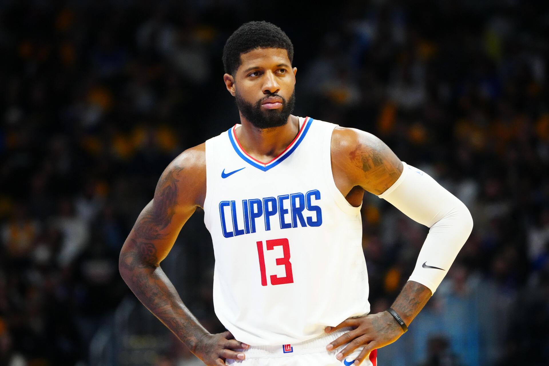Nov 14, 2023; Denver, Colorado, USA; LA Clippers forward Paul George (13) reacts during in the second half against the Denver Nuggets at Ball Arena.