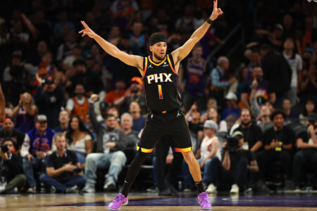 Nov 15, 2023; Phoenix, Arizona, USA; Phoenix Suns guard Devin Booker (1) reacts against the Minnesota Timberwolves in the first half at Footprint Center.