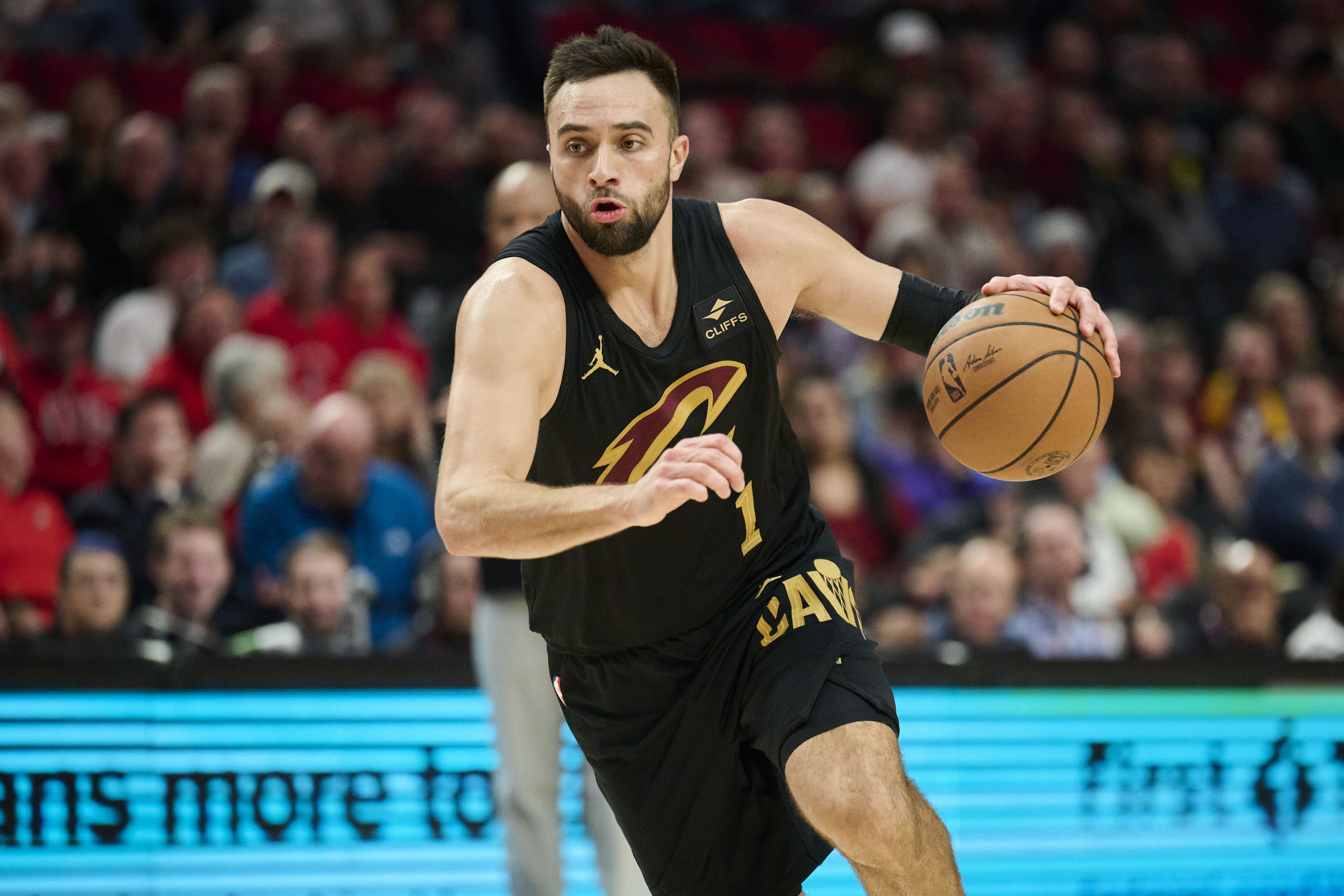 Nov 15, 2023; Portland, Oregon, USA; Cleveland Cavaliers guard Max Strus (1) drives to the basket during the second half against the Portland Trail Blazers at Moda Center.