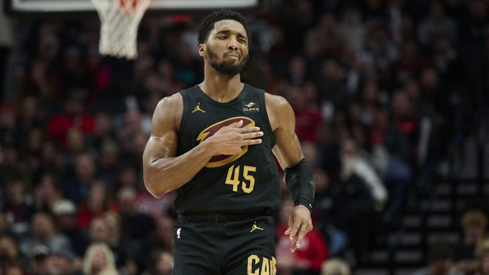 Nov 15, 2023; Portland, Oregon, USA; Cleveland Cavaliers guard Donovan Mitchell (45) reacts after scoring a three point basket during the second half against the Portland Trail Blazers at Moda Center.