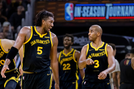Golden State Warriors forward Kevon Looney (5) and guard Chris Paul (3) re-enter the court after a time-out during the second half of the game against the Minnesota Timberwolves at Chase Center.