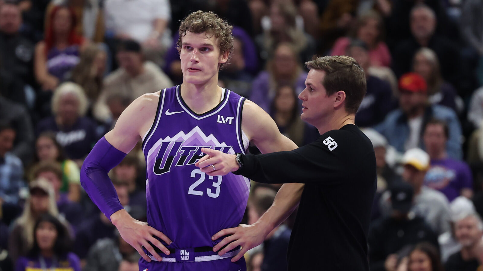 Nov 17, 2023; Salt Lake City, Utah, USA; Utah Jazz forward Lauri Markkanen (23) and head coach Will Hardy speak while the Phoenix Suns shoot free throws in the fourth quarter at Delta Center.